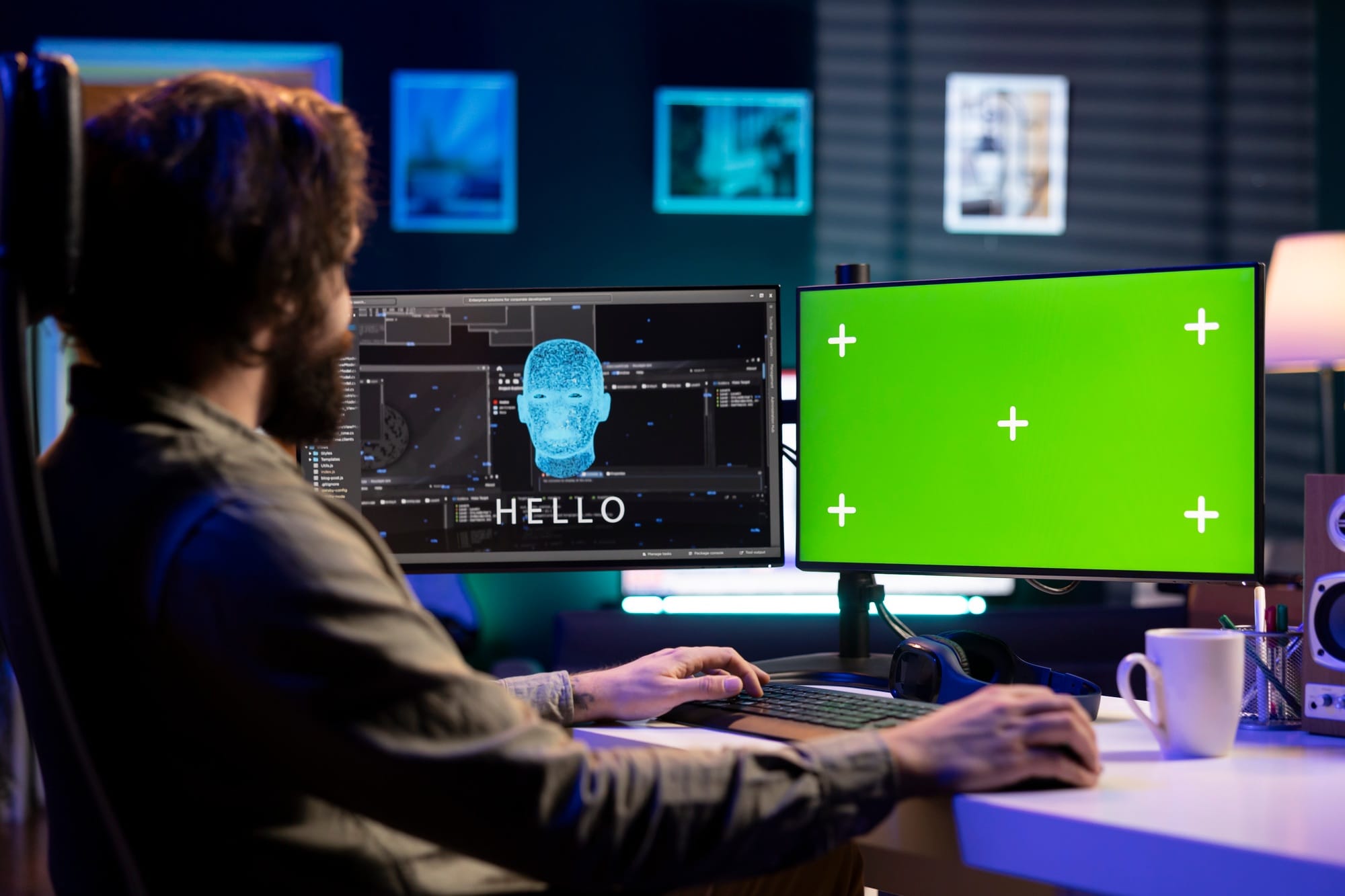 Sentient AI on green screen monitor interacting with computer engineer